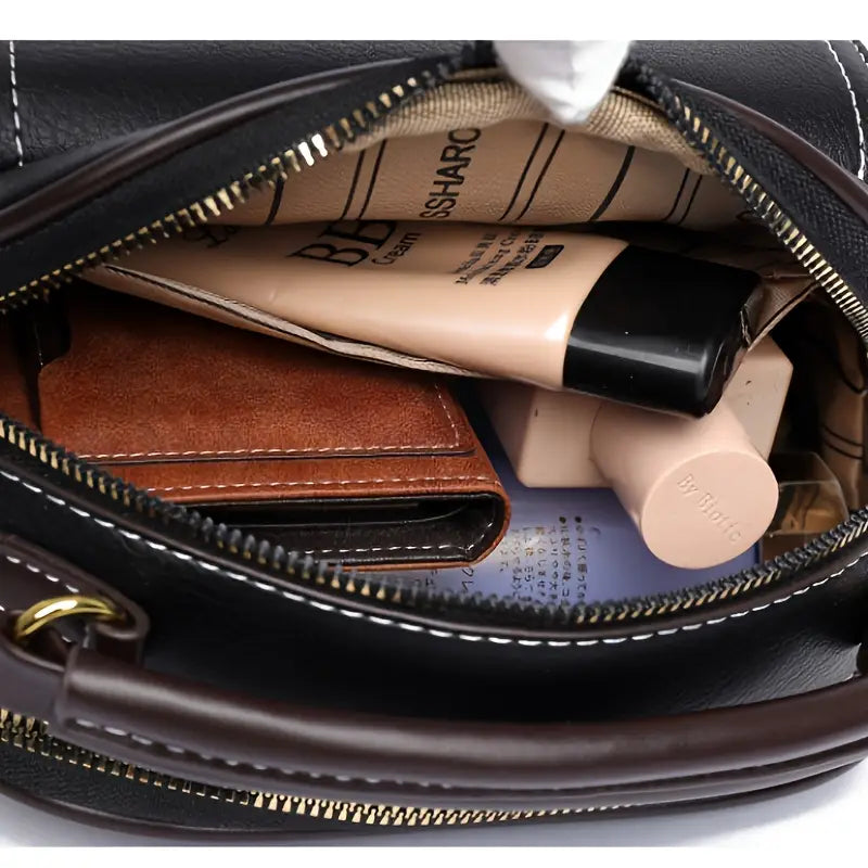 Elegant crossbody bag with two layers and wide strap