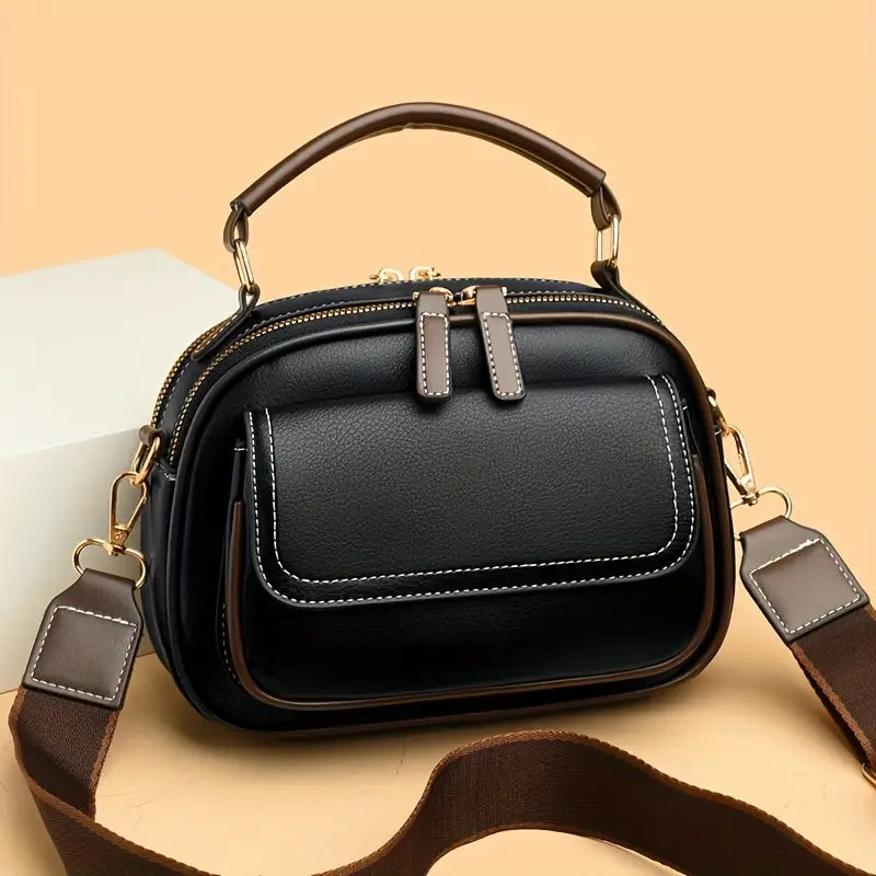 Elegant crossbody bag with two layers and wide strap